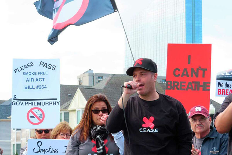 Peter Naccarelli, a Borgata casino dealer who is one of the leaders of a movement to ban smoking in Atlantic City, N.J.'s casinos, speaks at a rally in the city in support of a proposed smoking ban on April 12, 2022. In August 2022, the possibility of casinos creating outdoor smoking areas was being discussed among New Jersey legislators, who have so far not acted on a bill that would ban smoking inside Atlantic City's nine casinos.Wayne Parry/AP