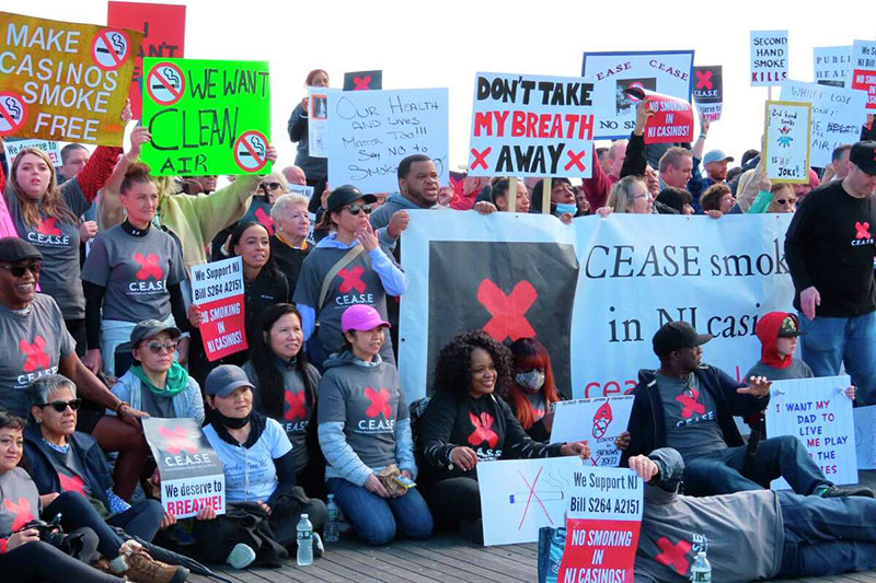 FILE - Casino workers and smoking opponents hold a rally in Atlantic City, N.J., on April 12, 2022, in support of a proposed ban on smoking in the city's nine casinos. In August 2022, the possibility of casinos creating outdoor smoking areas was being discussed among New Jersey legislators, who have so far not acted on a bill that would ban smoking inside Atlantic City's nine casinos.Wayne Parry/AP